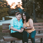 woman with parkinson's disease sitting with another woman on a bench