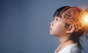 image of a child with a brain image superimposed