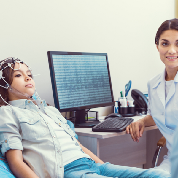 Girl getting an EEG for Autism treatment