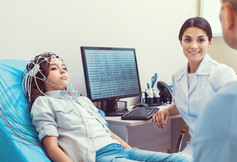 Girl getting an EEG for Autism treatment