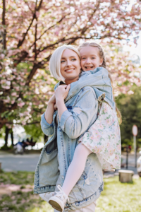 mom and daughter hugging
