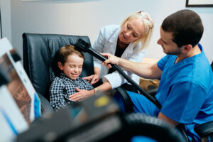 Child receiving autism treatment with MeRT