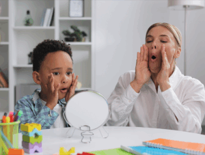 Child with autism in speech therapy